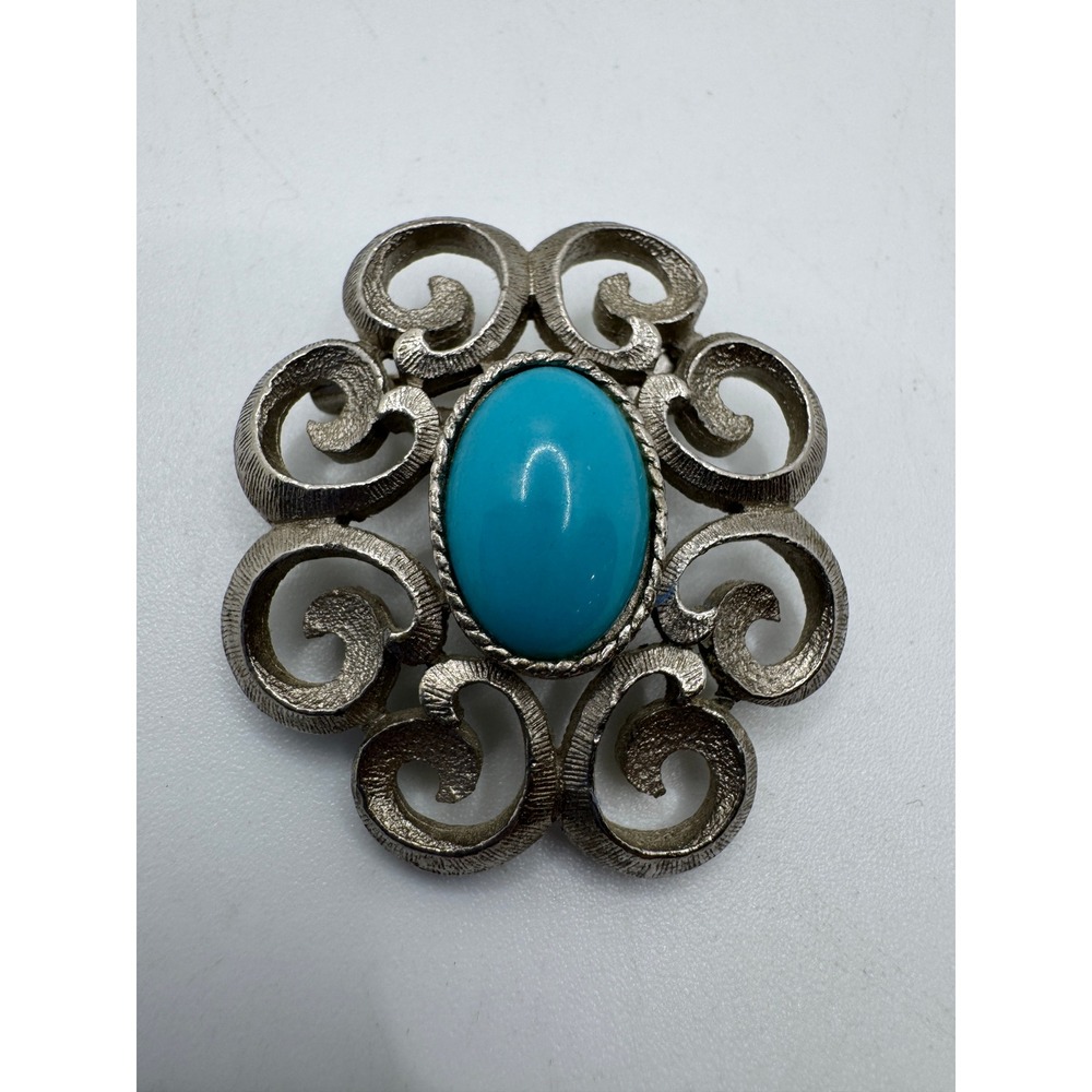 Vintage Silver Tone Scrollwork Brooch with Turquoise Oval Cabochon Center